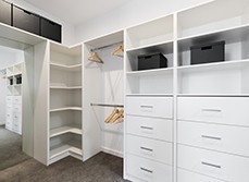 A large walk in wardrobe cabinetry detail in new home