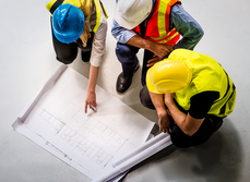 Builders looking at plans