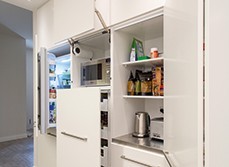 Image of a small kitchen renovated to improve storage space