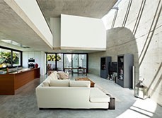Concrete flooring in living room.