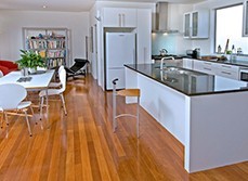 Renovation specialist providing information to renovator.