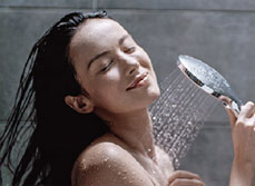 American standard Easyset shower being used by lady taking a shower