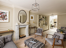 Scandinavian design meets victorian flair in living room