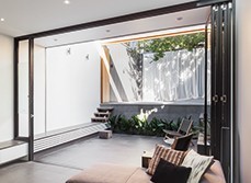 A bedroom with an outdoor flow