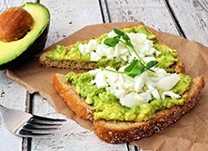 Image of toast with smashed avocado and crumbled feta