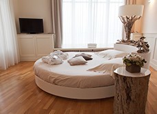 The romantic bedroom with round bed