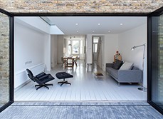Living room in white background with grey sofa