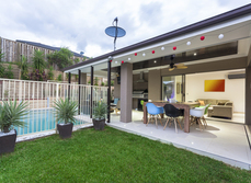 A outdoor living area that extends from inside.