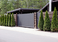 Large front gates to the exterior of a property