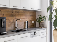 A new kitchen, with recycled wood splash backs