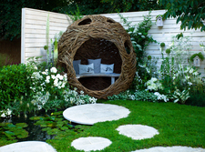 A garden pod for sitting and reading and relaxing in