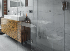 A large bathroom with free standing bathroom and walk in wet room style shower