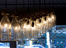 Upcycled glass bottles used for statement lighting.