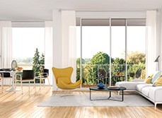 A living room with yellow chair and glass window