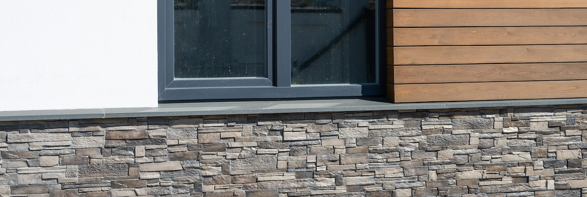 House exterior with three types of cladding