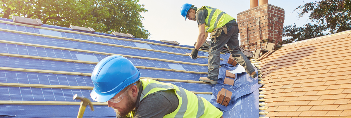 roofing installers on roof