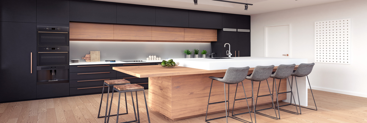 A large kitchen with reclaimed wood and black fittings