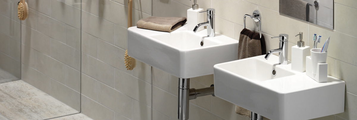 a simple clean bathroom renovation designed to make a small space look bigger
