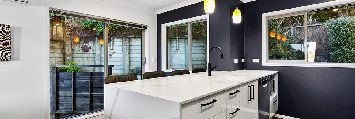 This stylish kitchen transformation in Wellington combines several exciting features to create a fresh new look.