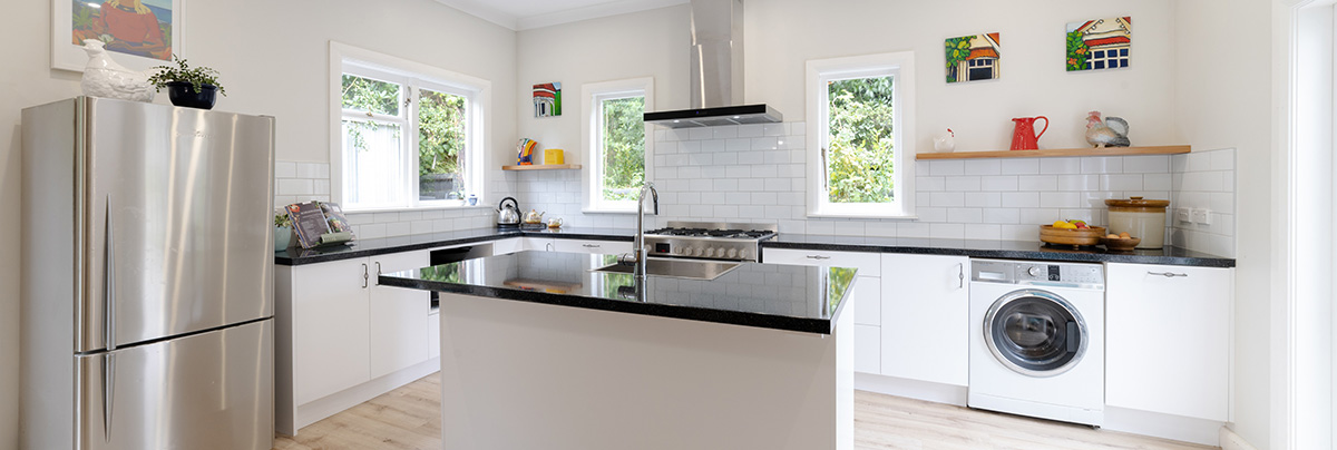 open plan kitchen with subway tile backsplash