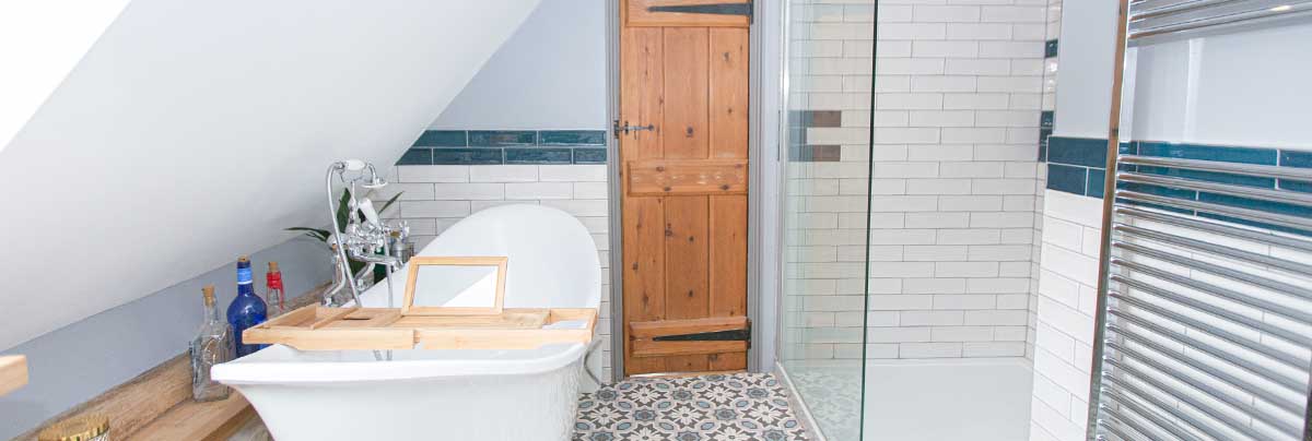 A chic family bathroom and WC design for a rustic farmhouse renovation in Cambridge