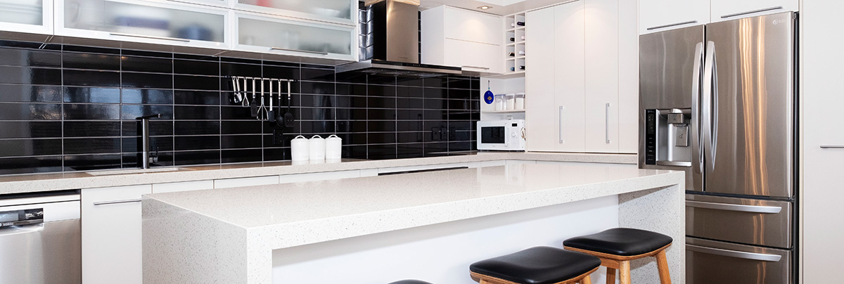 This family kitchen was already well laid out and spacious, but the homeowners wanted to freshen up its look and upgrade its functional feat