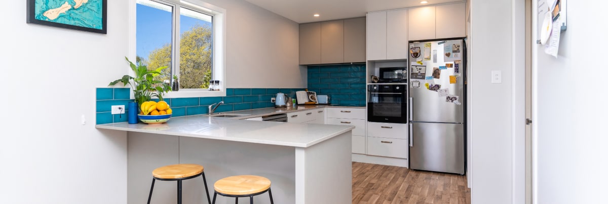 kitchen renovation with blue tiles