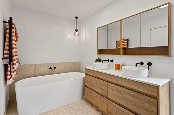 bathroom renovation in Australia with speckled tile shower