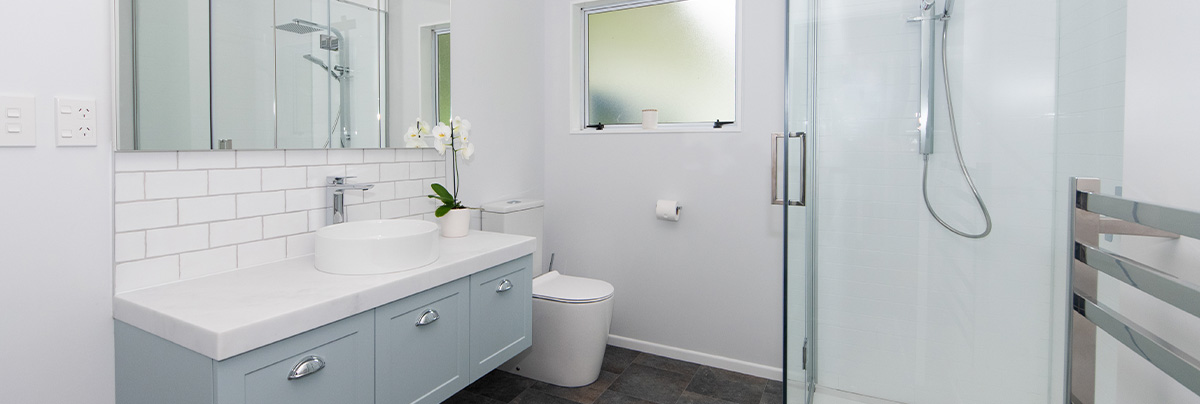 Modern sink and glass shower cabin