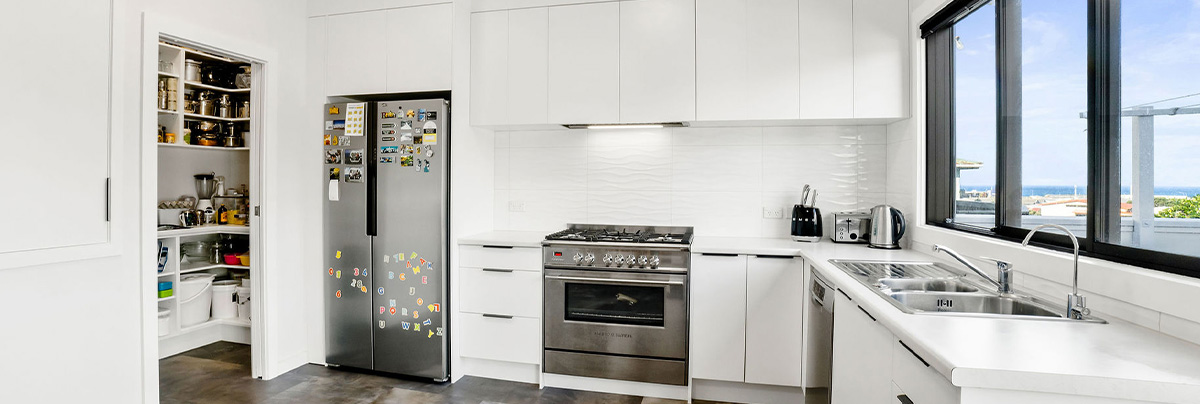 Kitchen with white cabinets