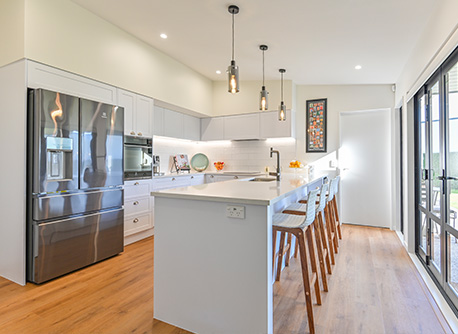 Kitchen renovations with bright white finishes 