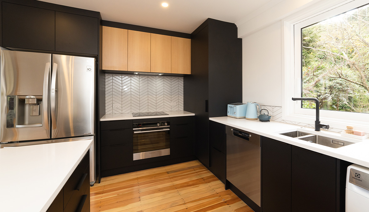 Black and white kitchen with a modern sink
