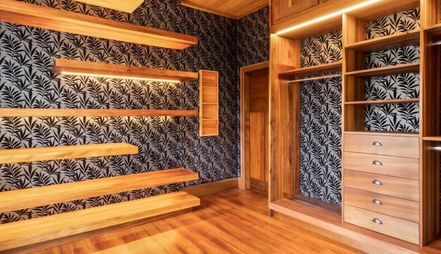  Unique native timber shelving from a room renovation in Fielding, Manawatu with floral wallpaper