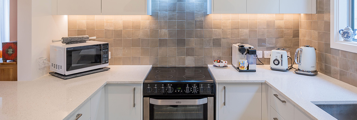Kitchen with splashback lighting 