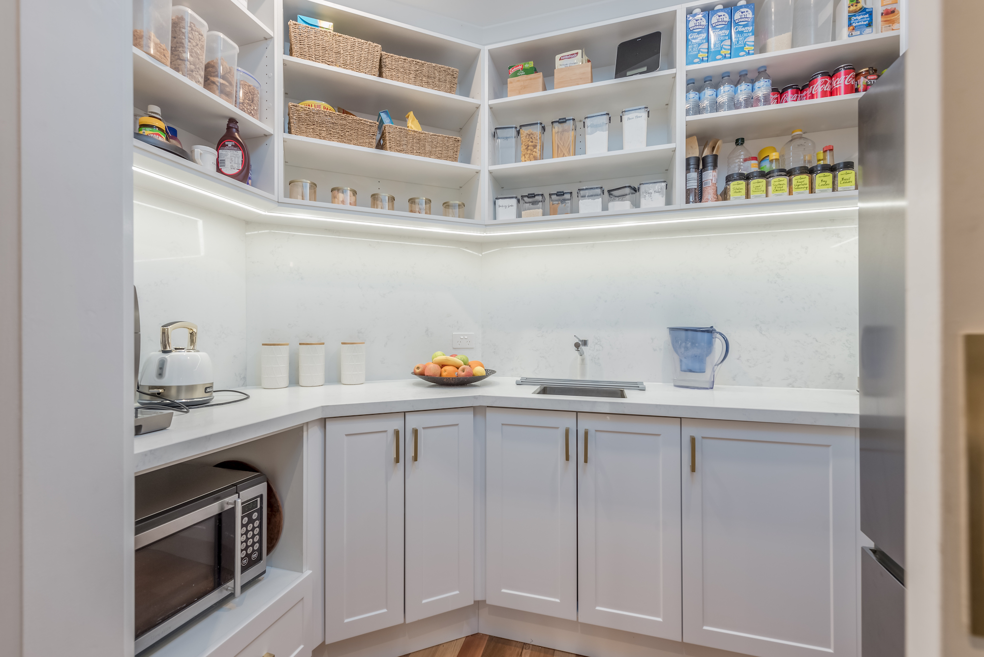 Walk-in pantry with plentiful storage