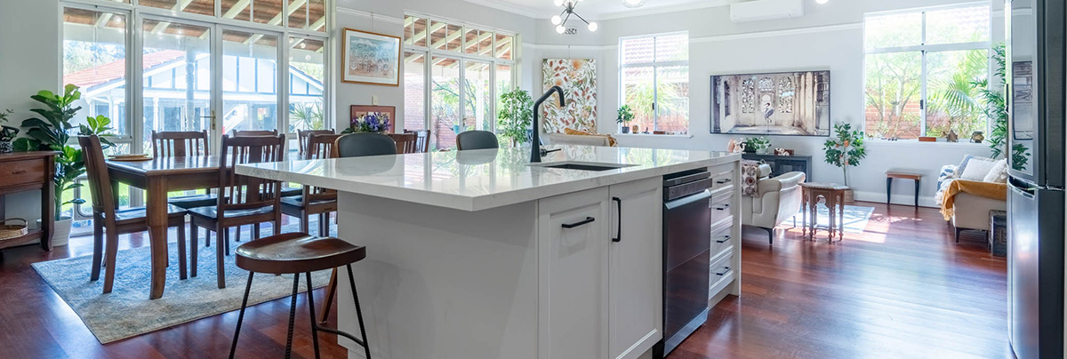 Kitchen with hardwood floorboards
