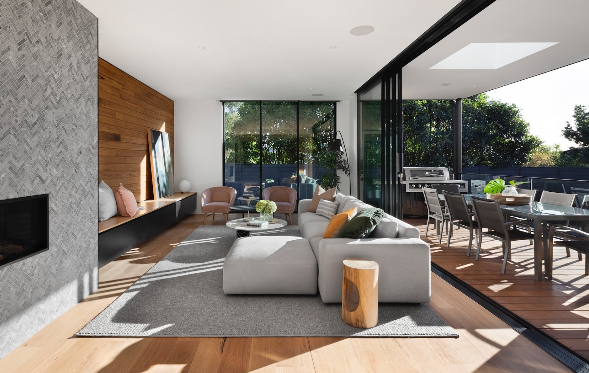 Living room renovation with wood materials and outdoor house extensions