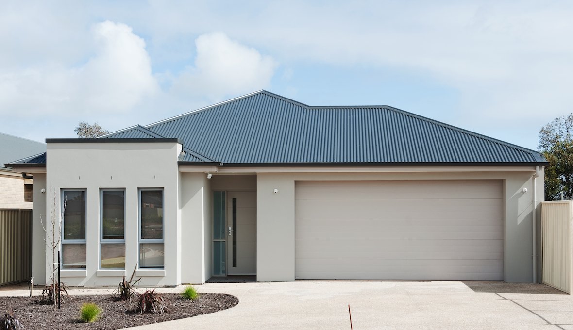 white house with rear extension