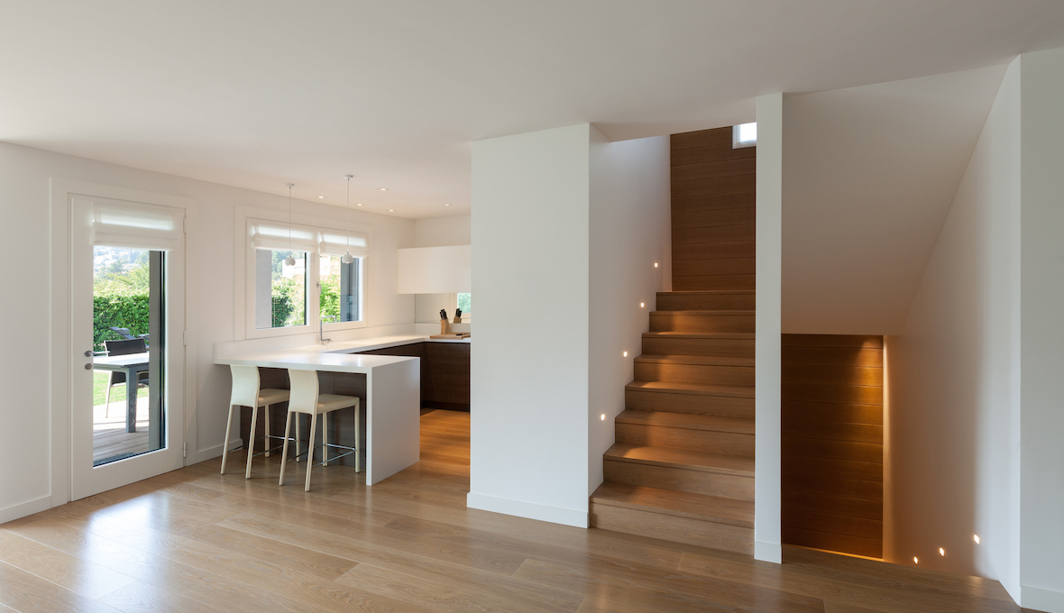 wooden stairs leading to a second storey addition