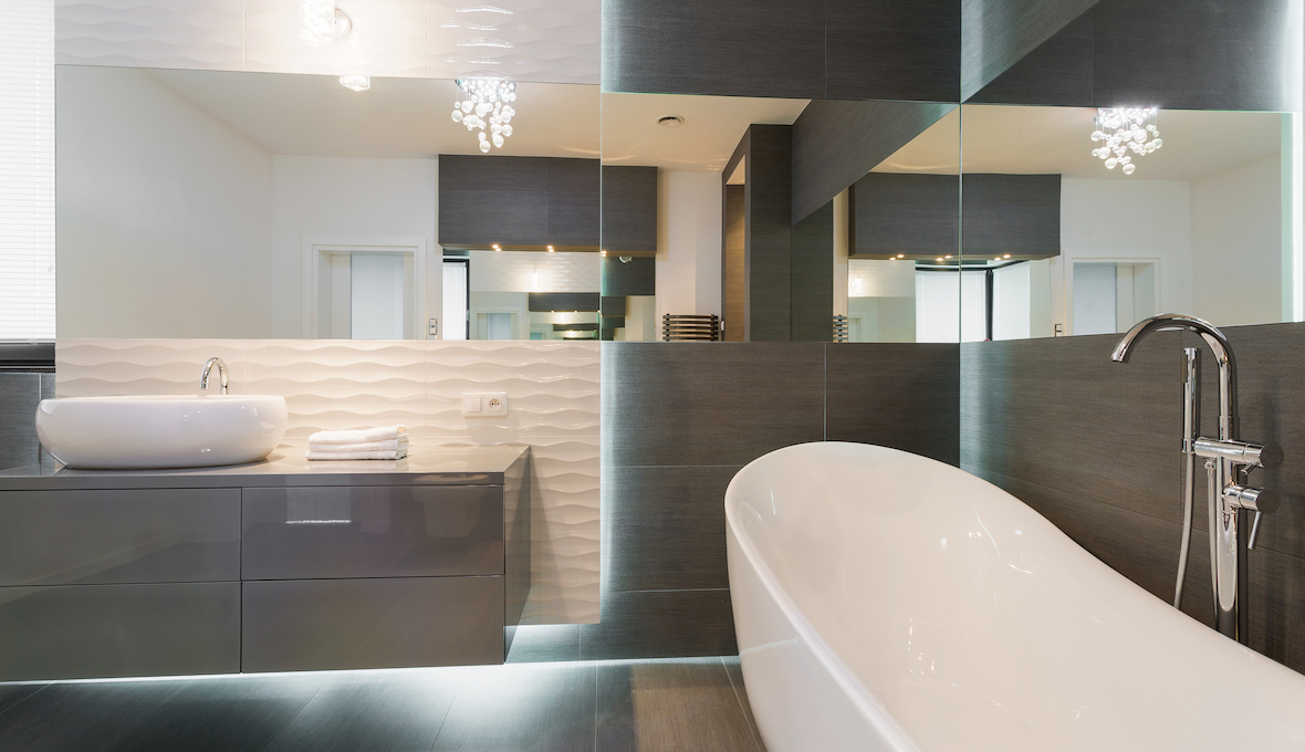 high end bathroom with LED lights and mirrors