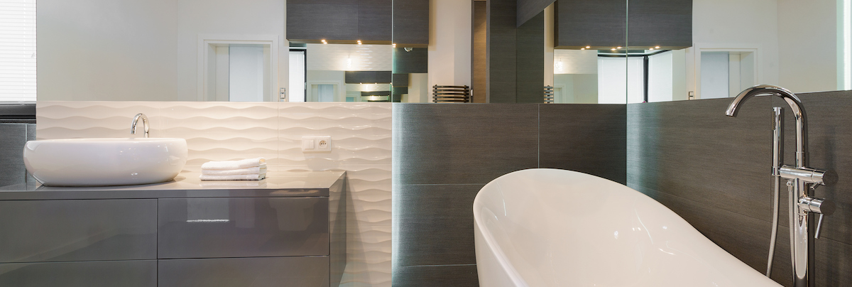 modern bathroom with bathtub and LED lights