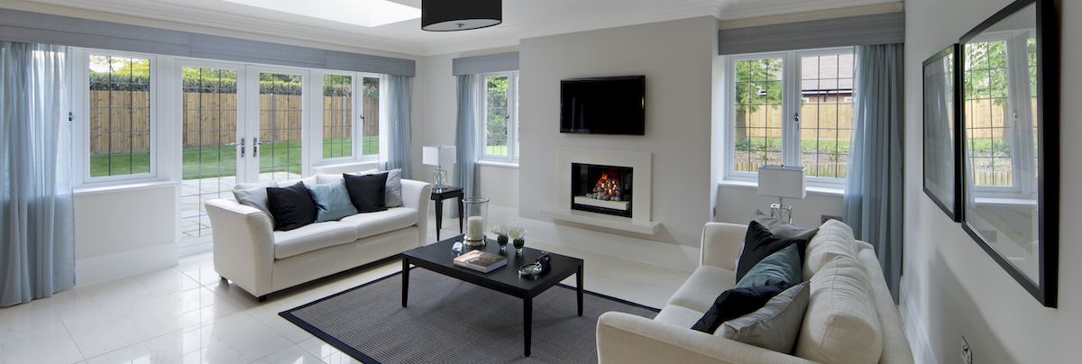 Lounge with bright interior, fireplace and marble floor