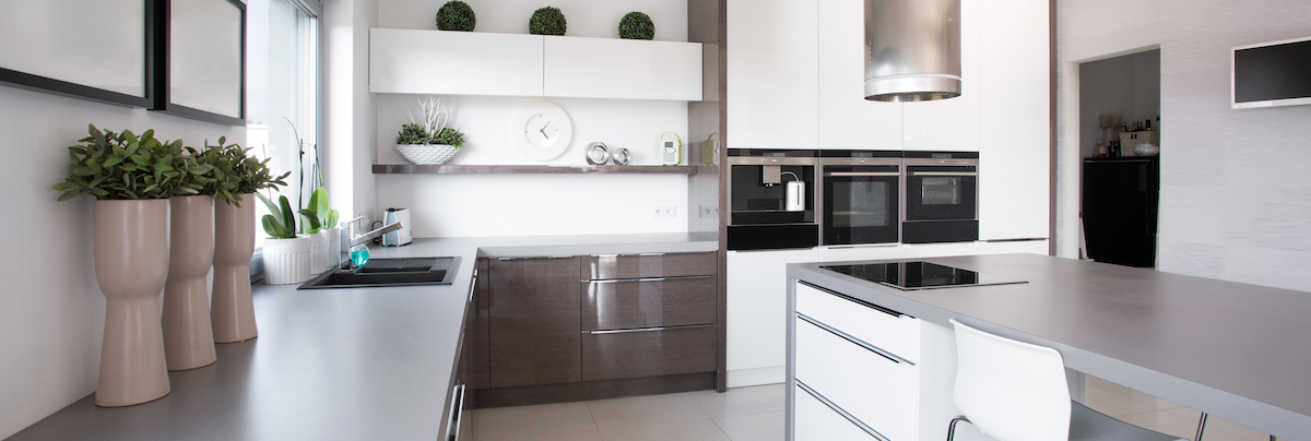 high-end modern looking kitchen with pipe shaped fan