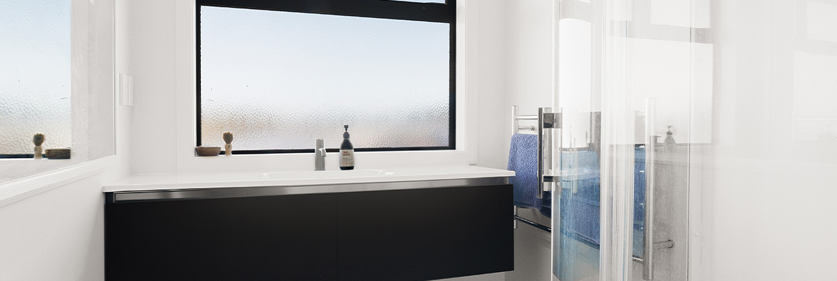 Bathroom with black sink