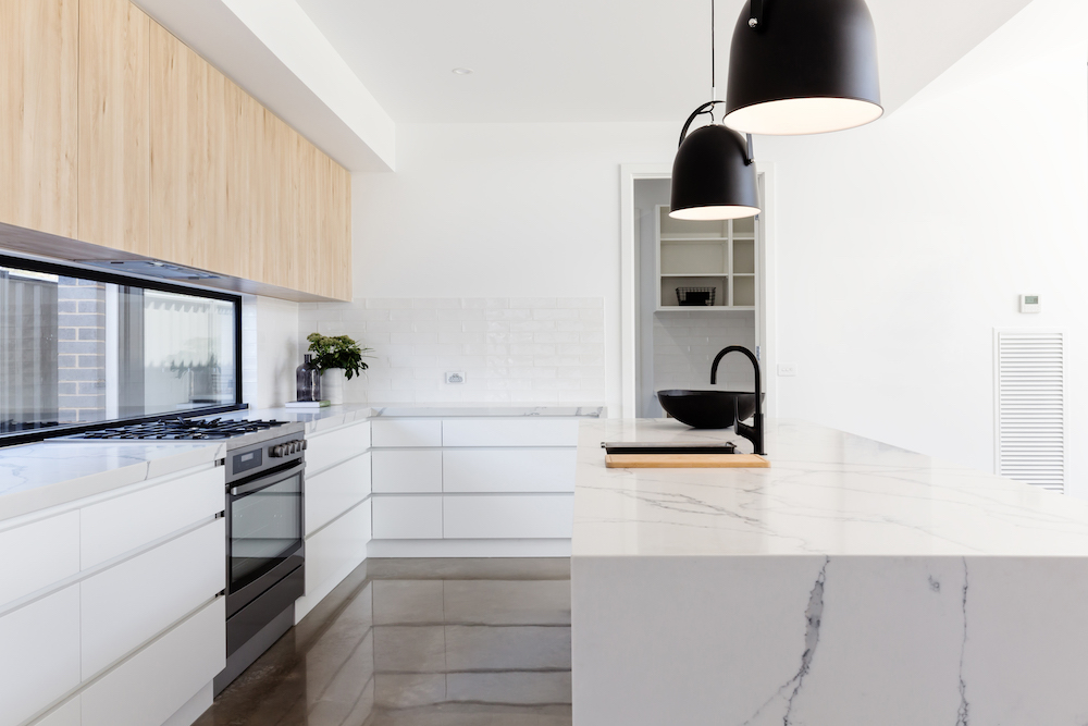 modern marble bench with black pendants