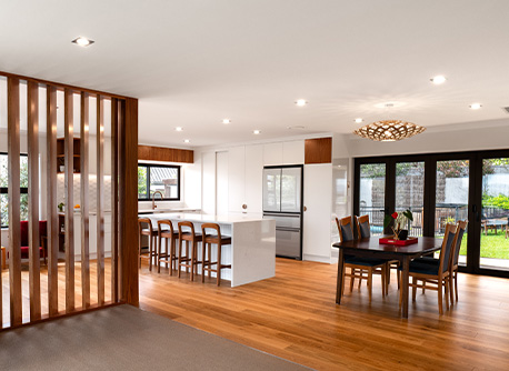 Open-plan living room with feature timber