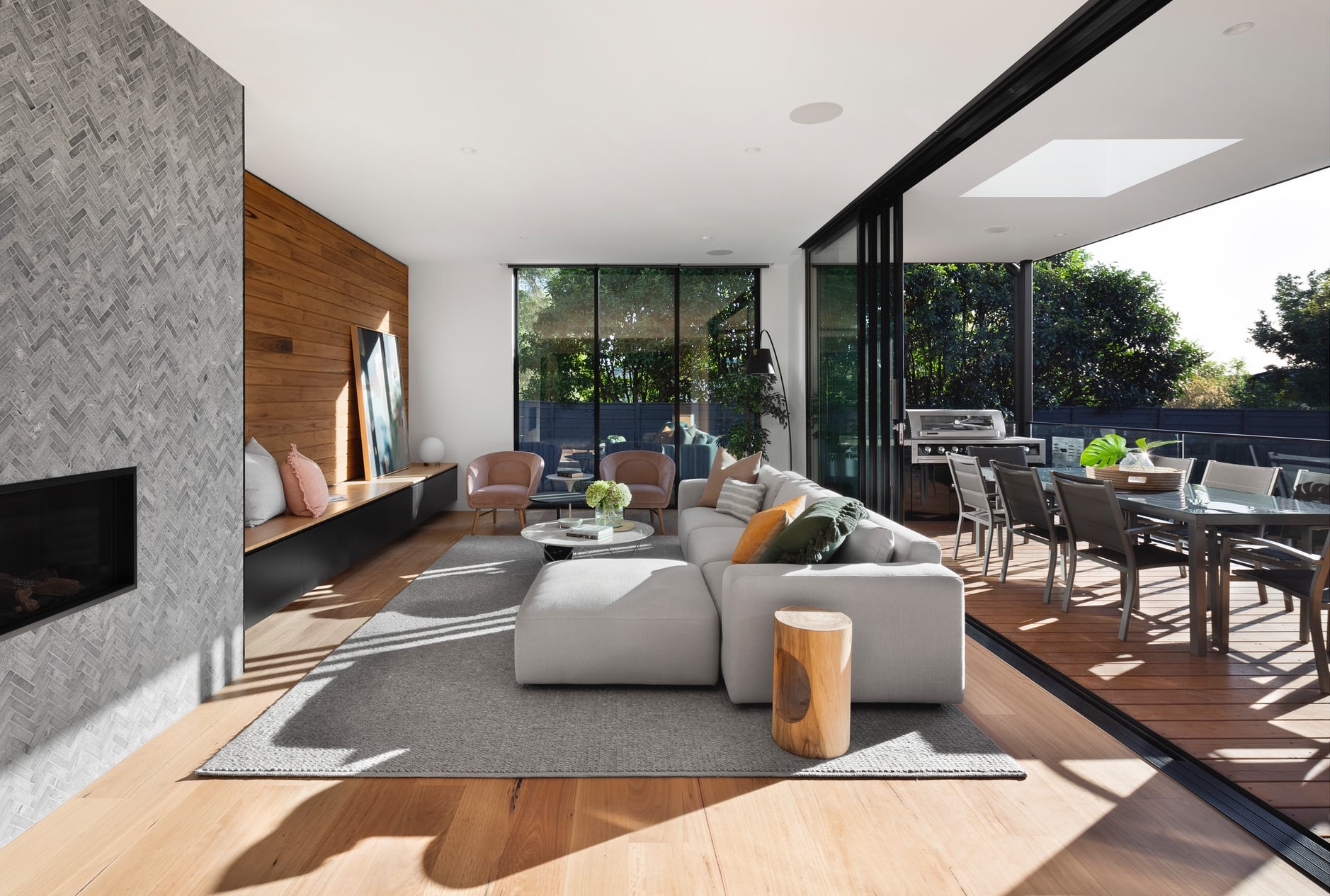 connected indoor lounge and outdoor dining area