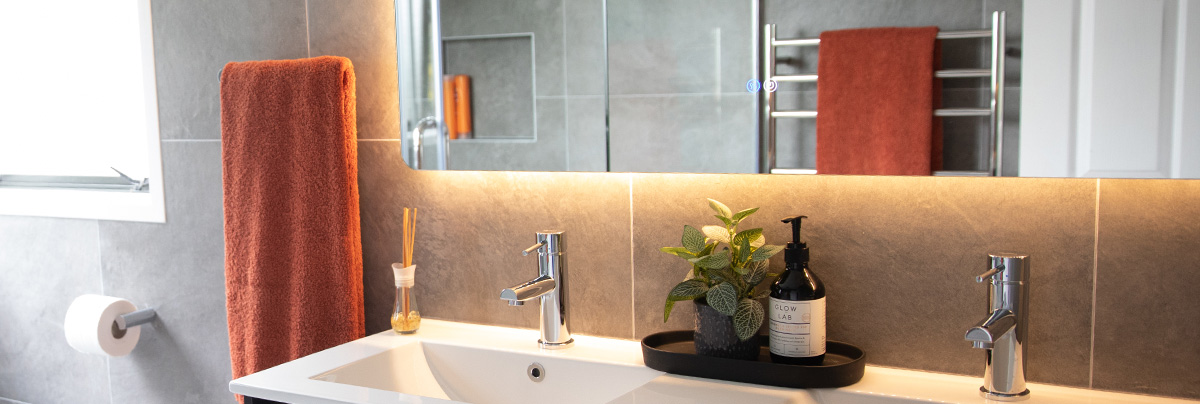 Bathroom vanity with backlit mirror 