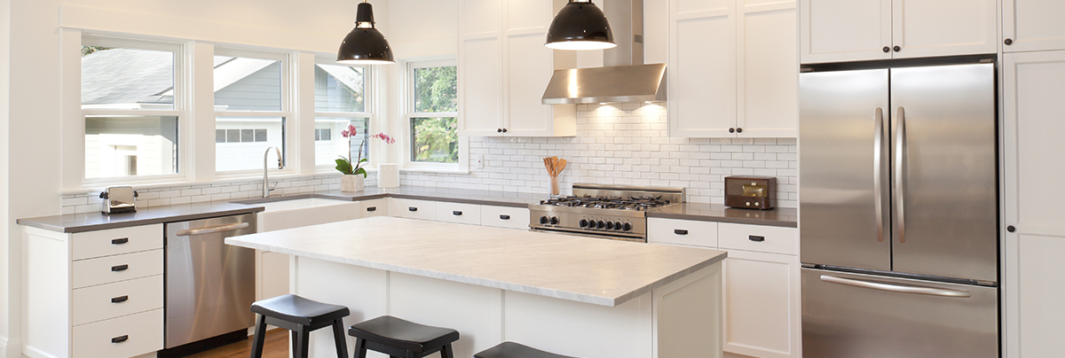 Kitchen with hanging pendant lights