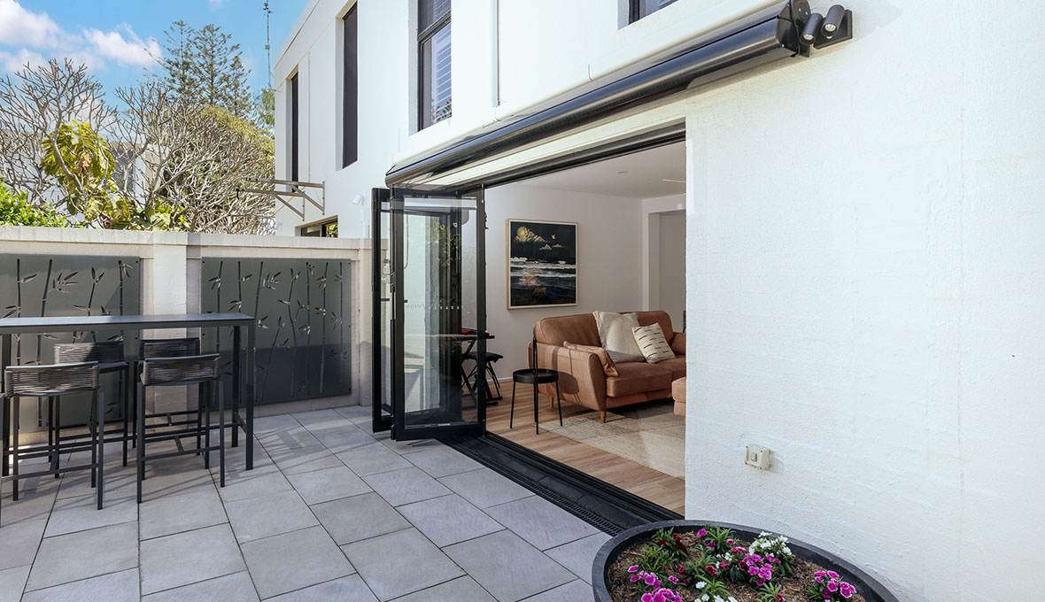 Living room opening onto patio